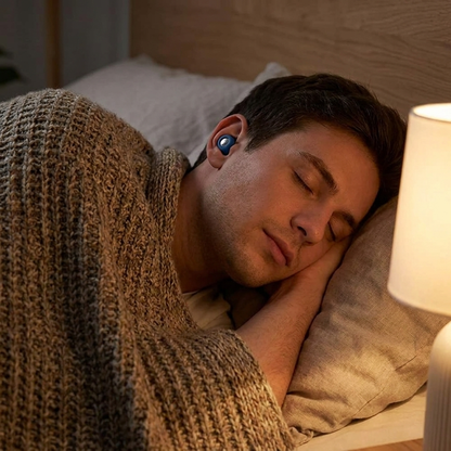 Retelon QuietSeal Earplugs - man sleeping calmly wearing earplug